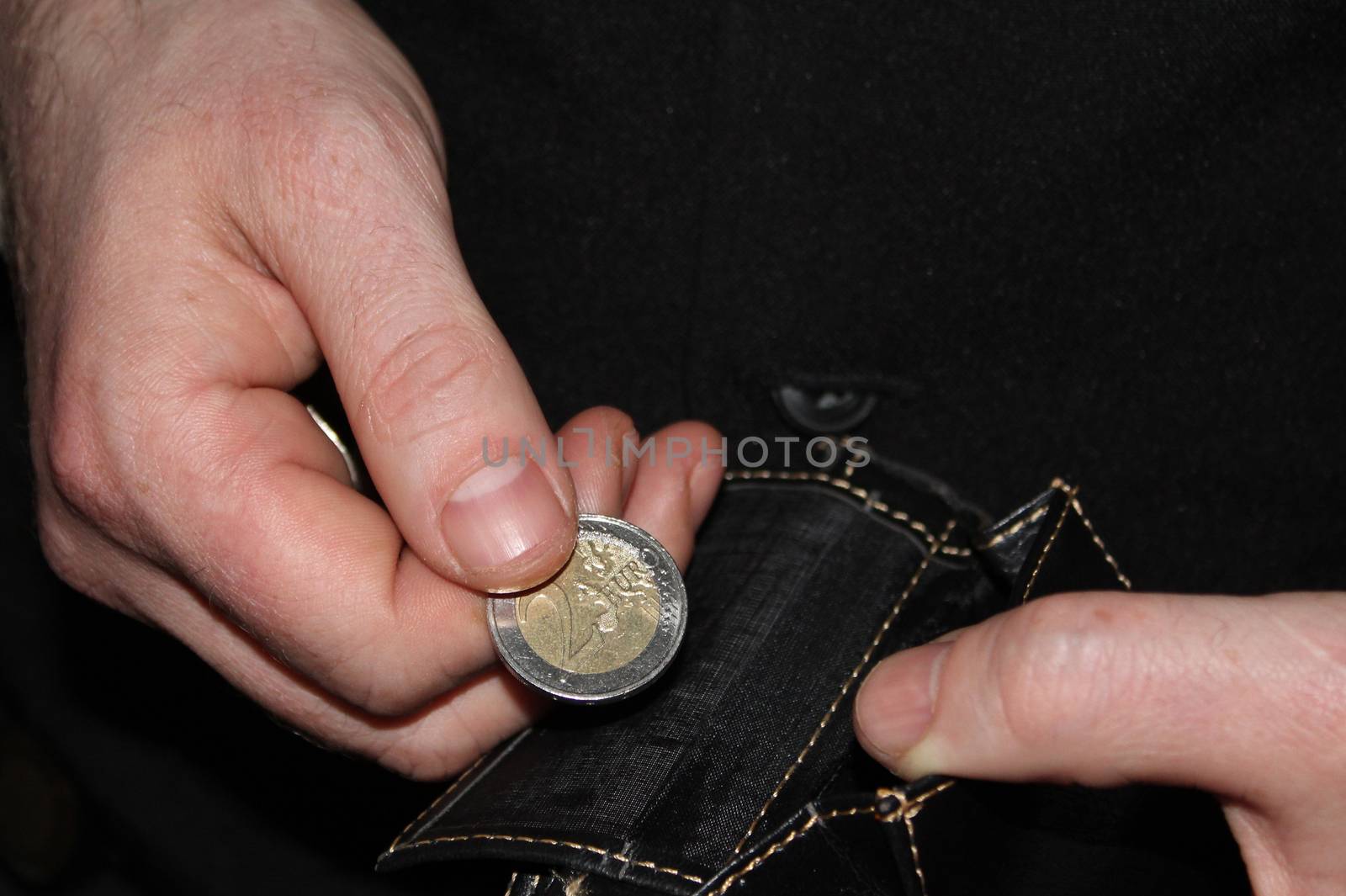 man hand holding a coins, finance concept, counting