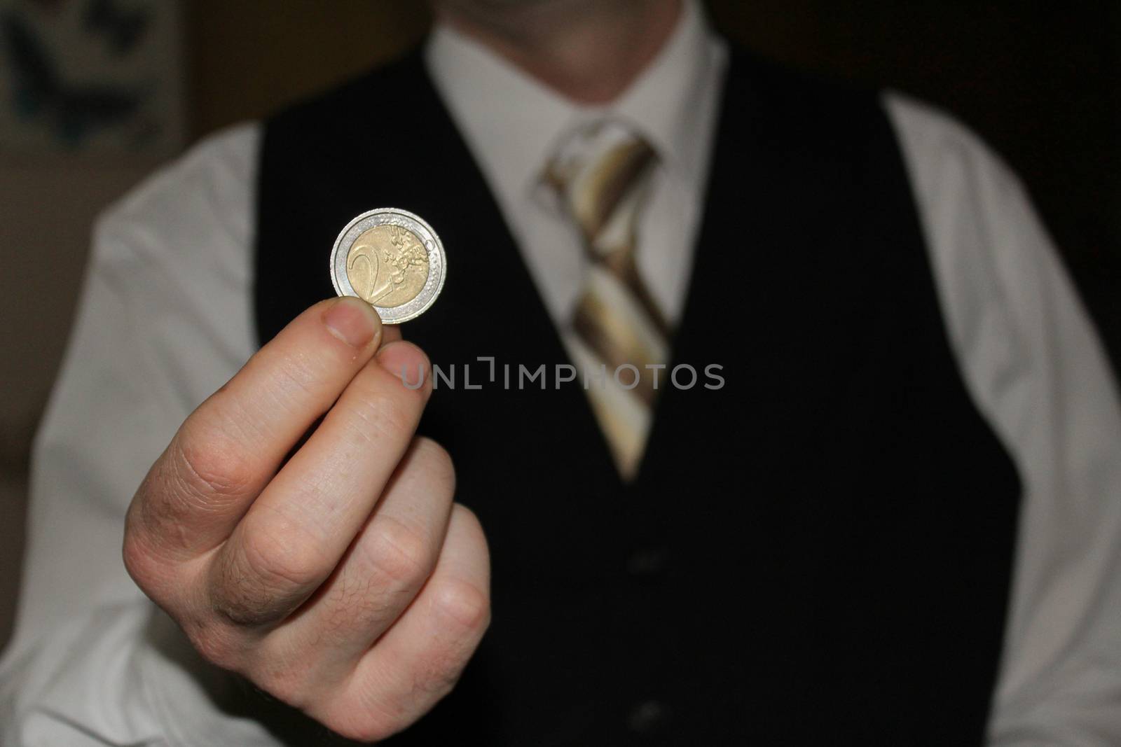 man hand holding a coins, finance concept by negmardesign