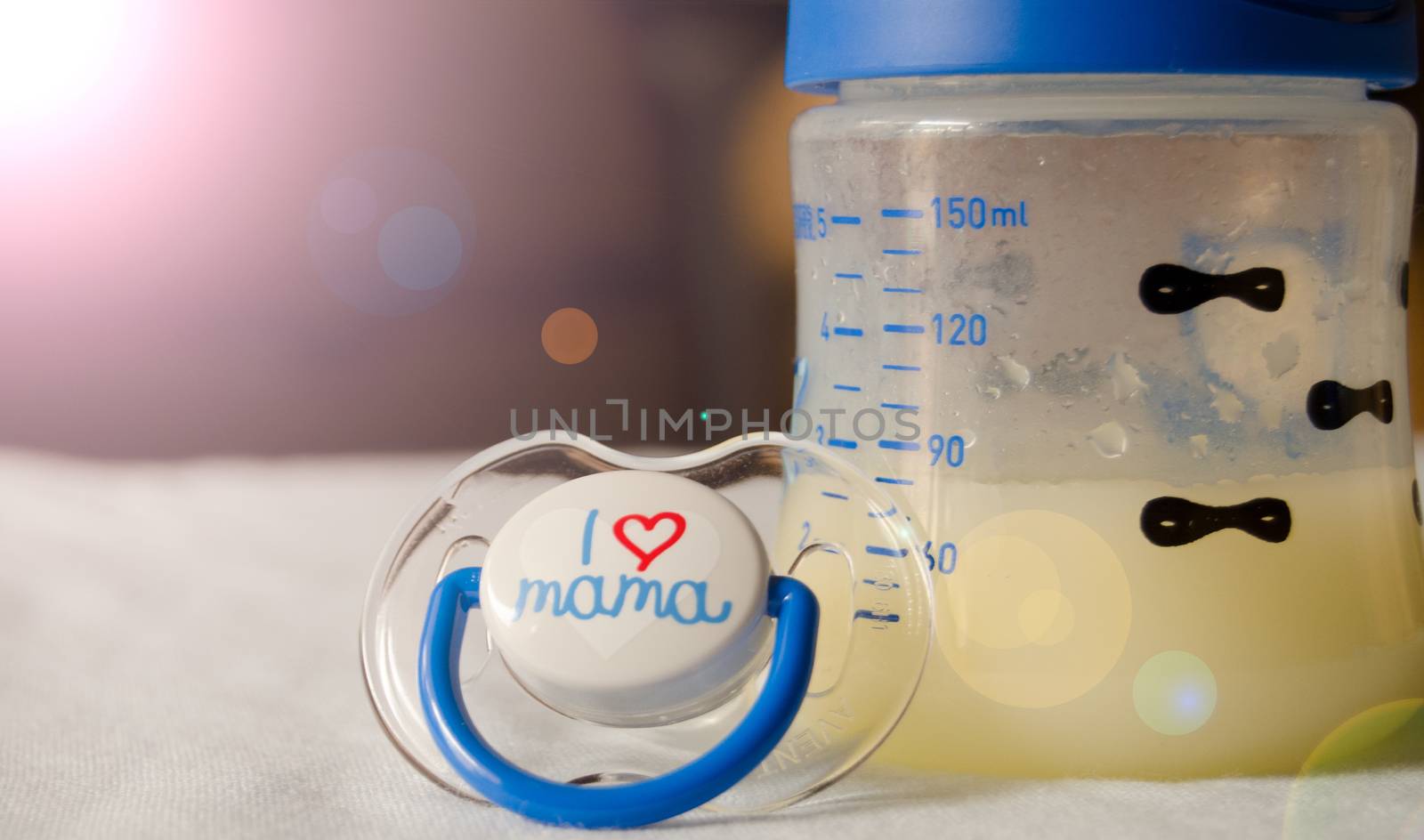 expresed milk 5 days after mother delivered baby, colostrum changing to a milk by negmardesign