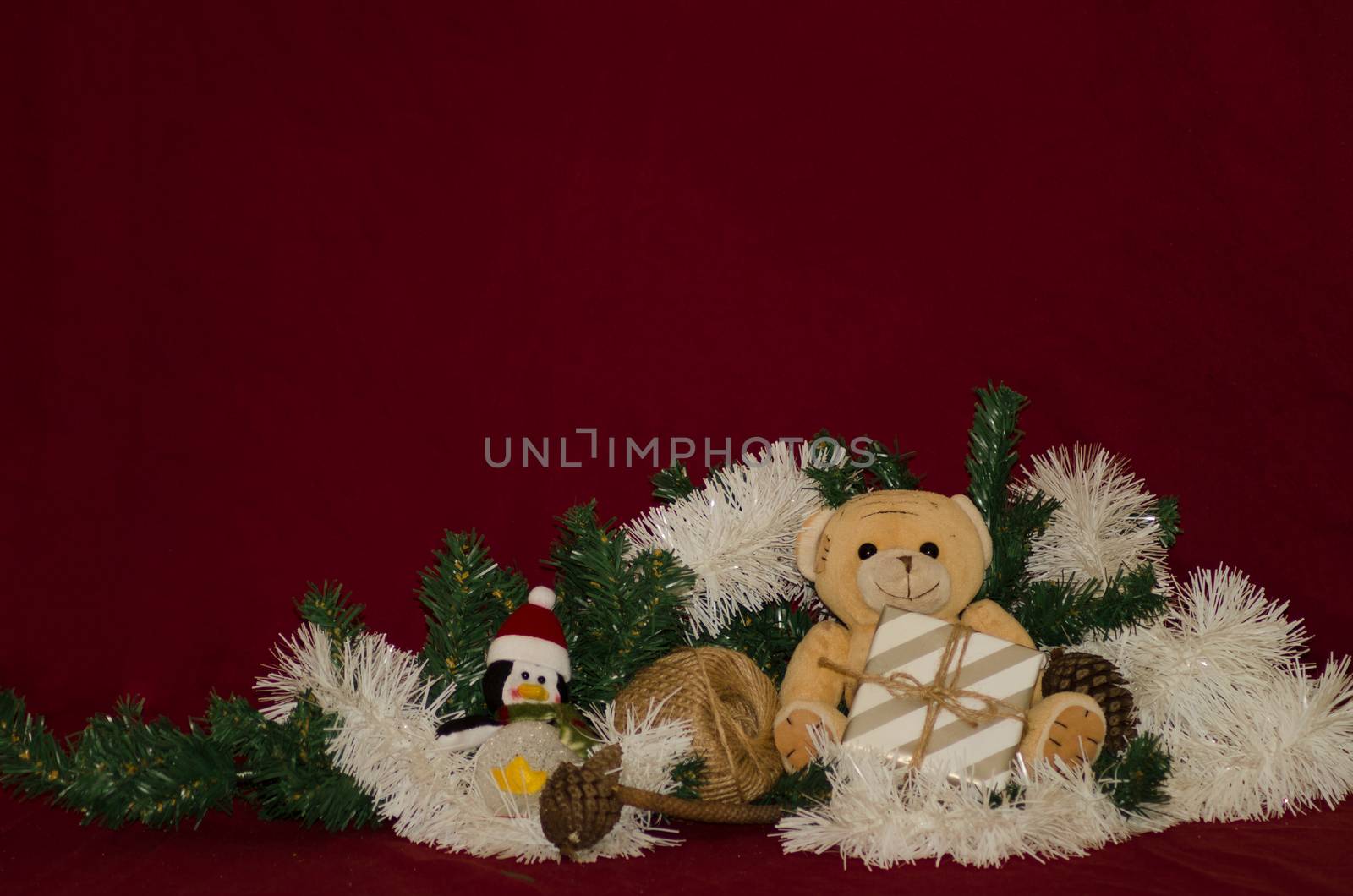 merry christmas postcard design with teddy bear and gift box red