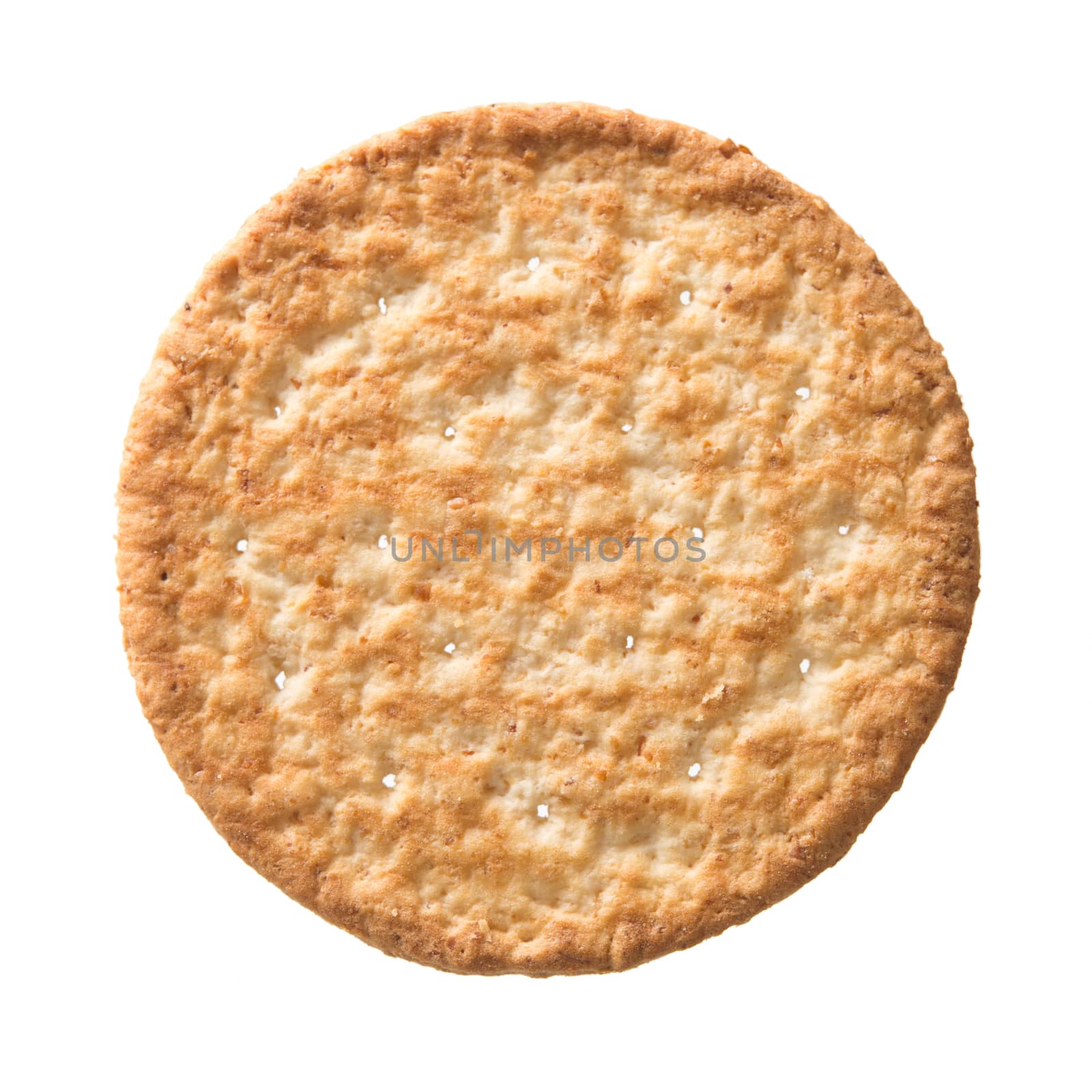 Top view wheat cracker. A single piece whole meal oat biscuit isolated on white background.