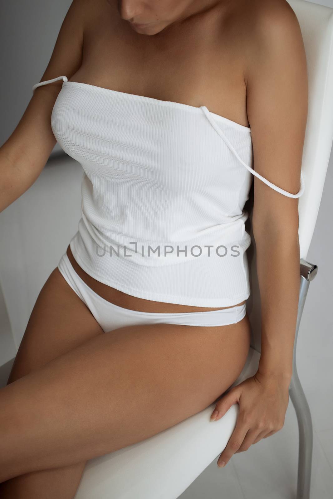 Girl with big Breasts in white lingerie