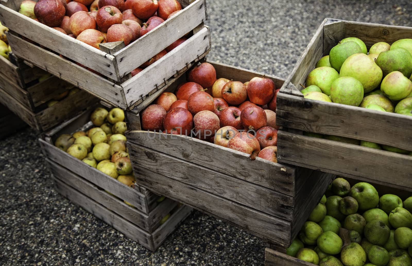 Apples in wooden boxes, detail of fresh fruit, diet and health