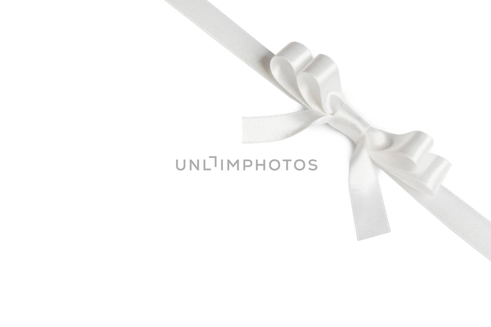 Shiny white satin ribbon and bow isolated on white background. Holiday gift concept