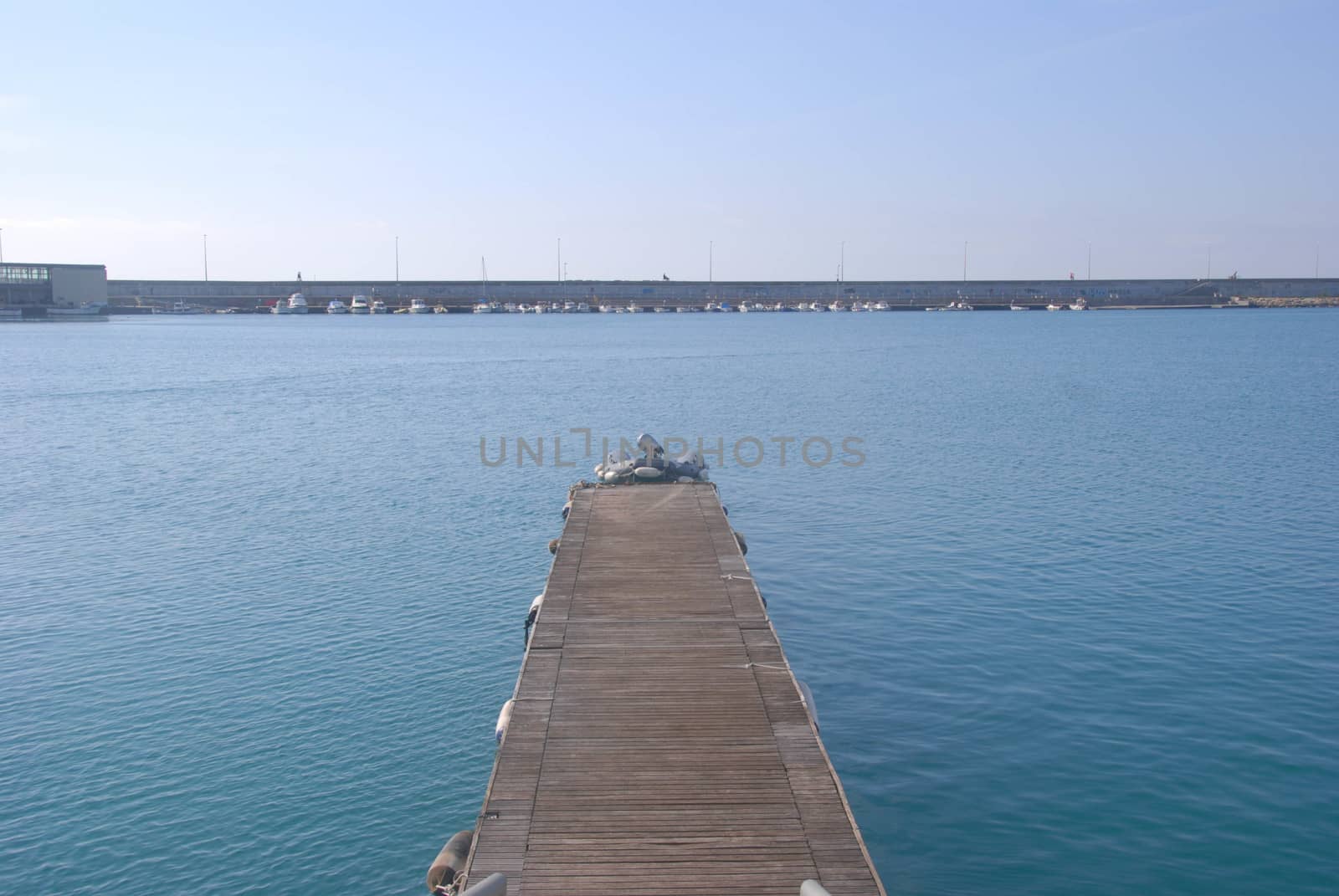 Pier at the harbor of Imperia by cosca