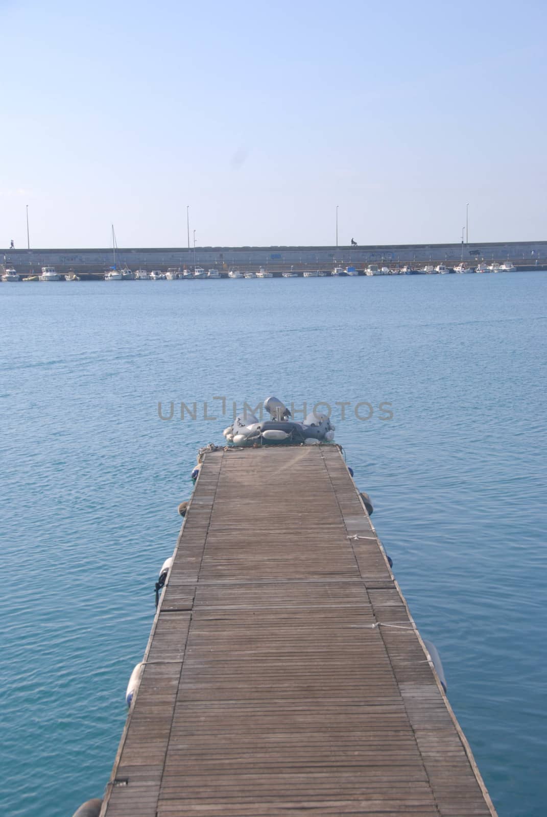 Pier at the harbor of Imperia by cosca