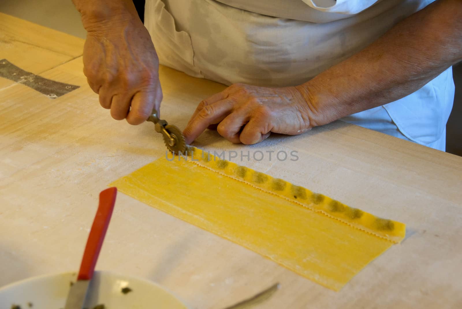 Preparation of agnolotti. Typical pasta of the Langhe, Piedmont - Italy