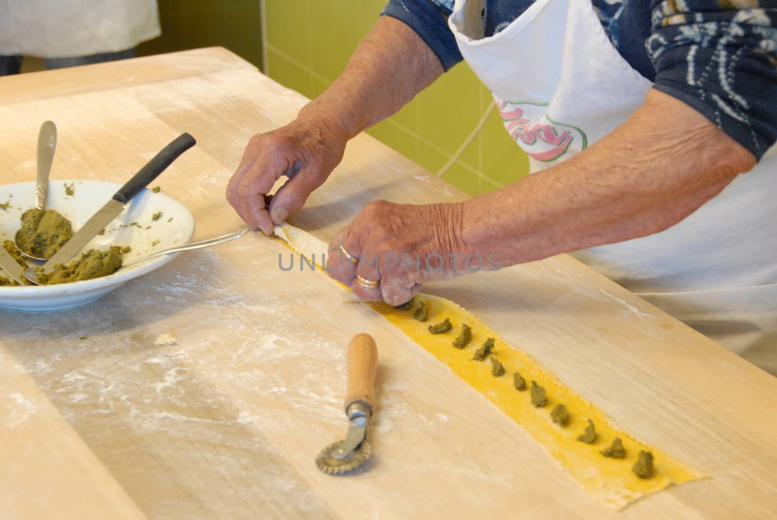 Preparation of agnolotti. Typical pasta of the Langhe, Piedmont - Italy