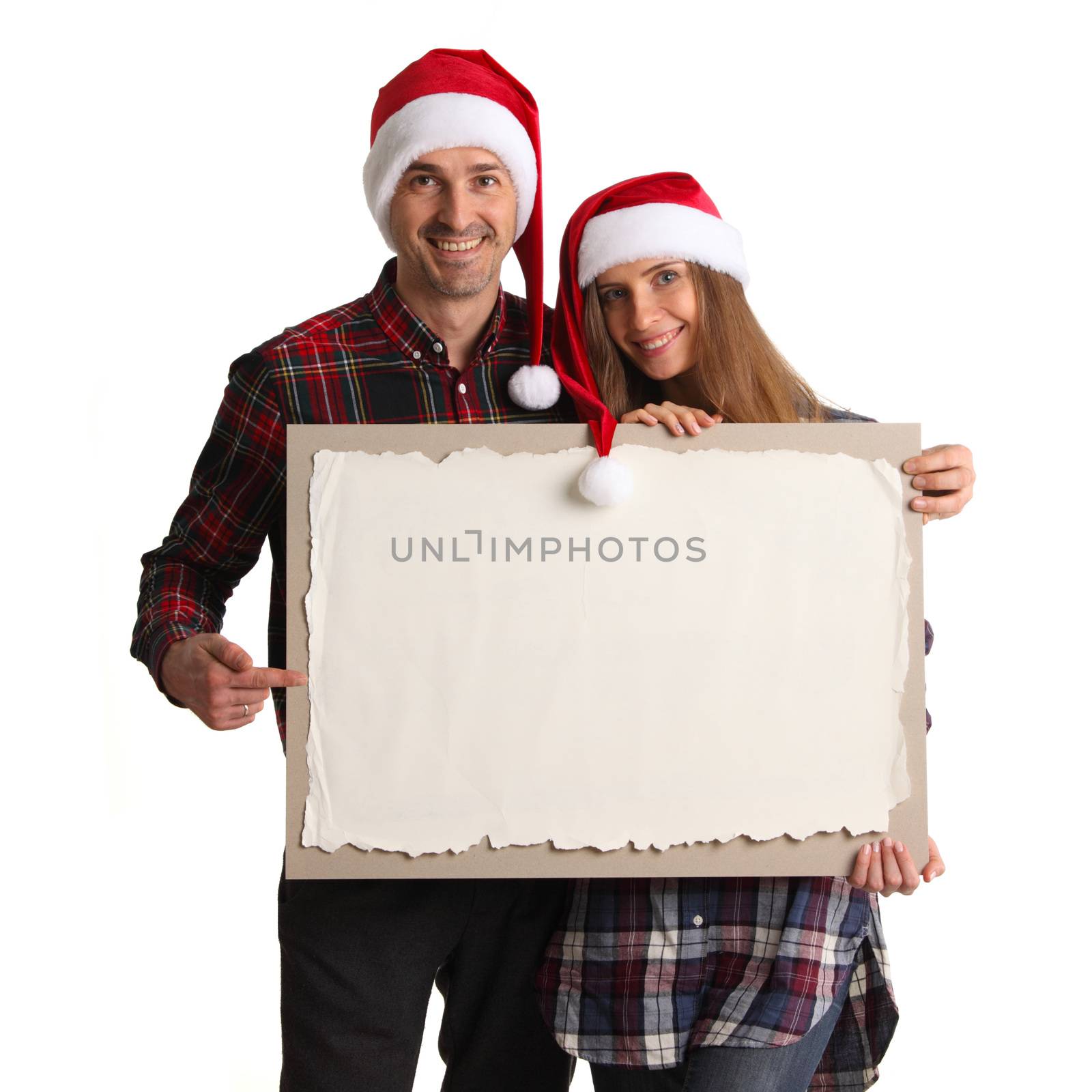 Couple in Santa hats with banner by ALotOfPeople