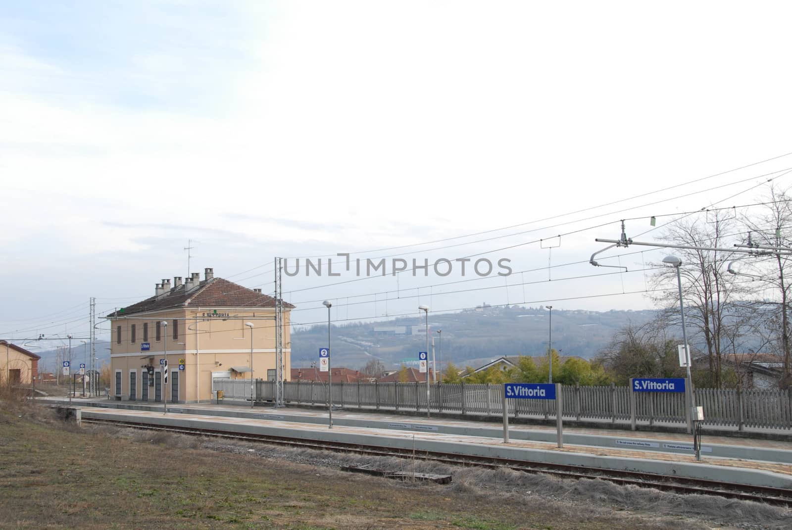 Railroad tracks near the Santa Vittoria d'Alba train station, Pi by cosca