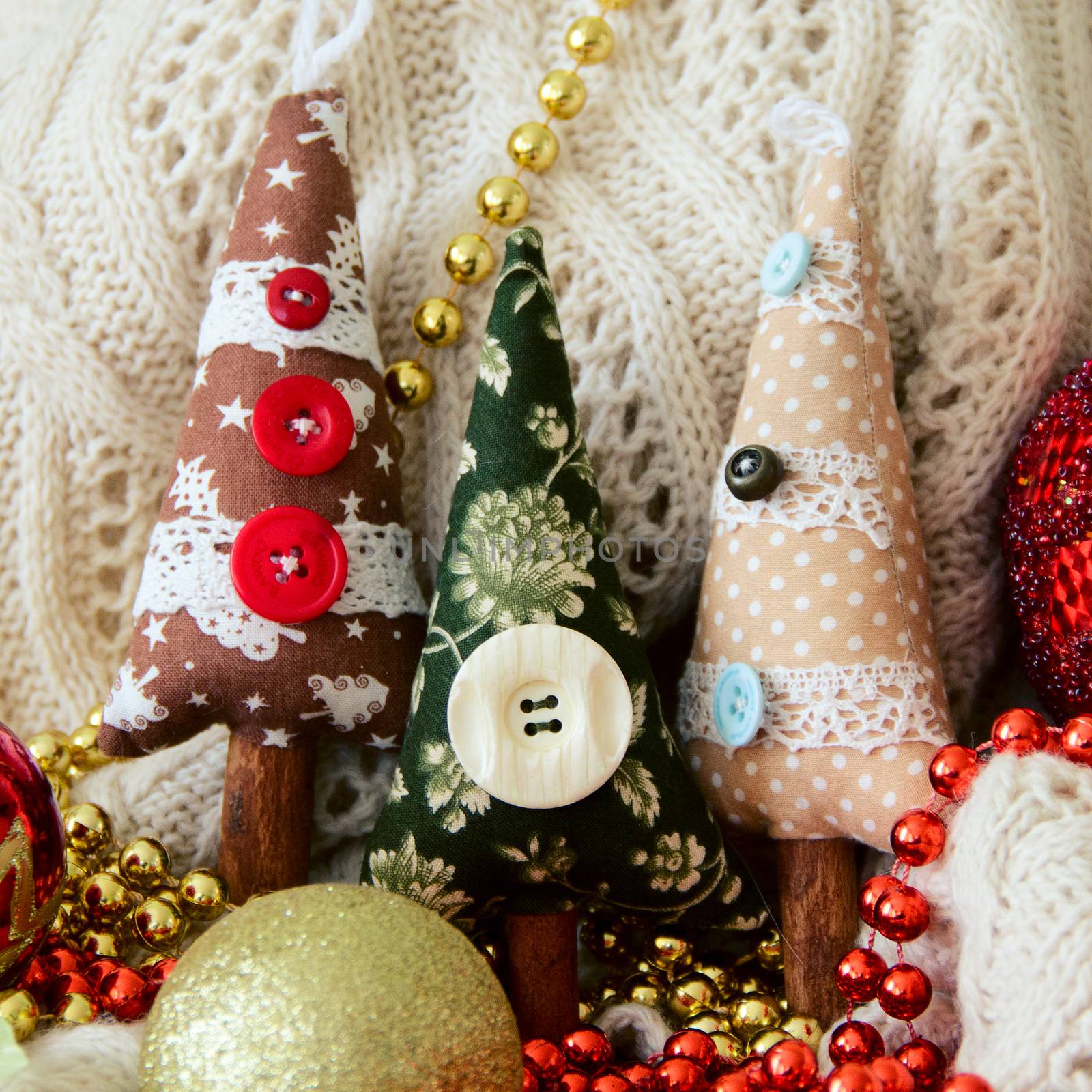 textile handmade toy brown, beige and green fir tree for Christmas. background. Photo