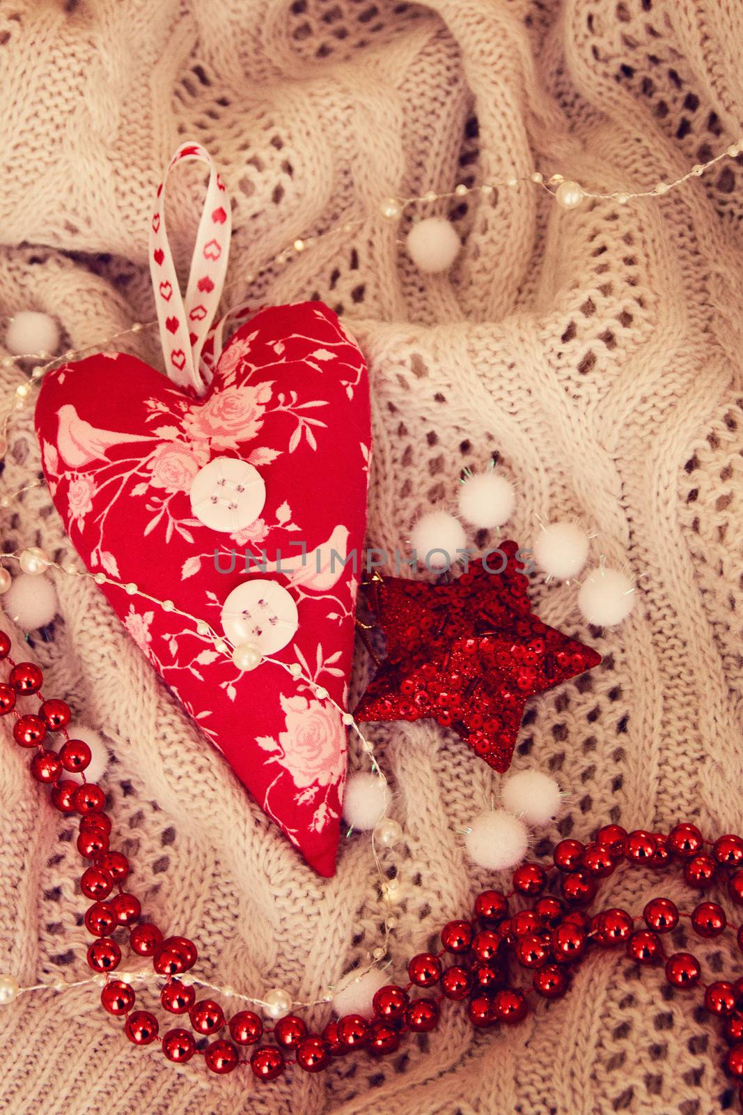 textile handmade toy heart for Christmas. Photo by Irinavk