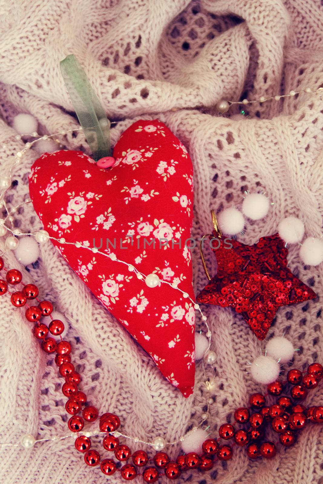 textile handmade toy heart for Christmas. Photo by Irinavk