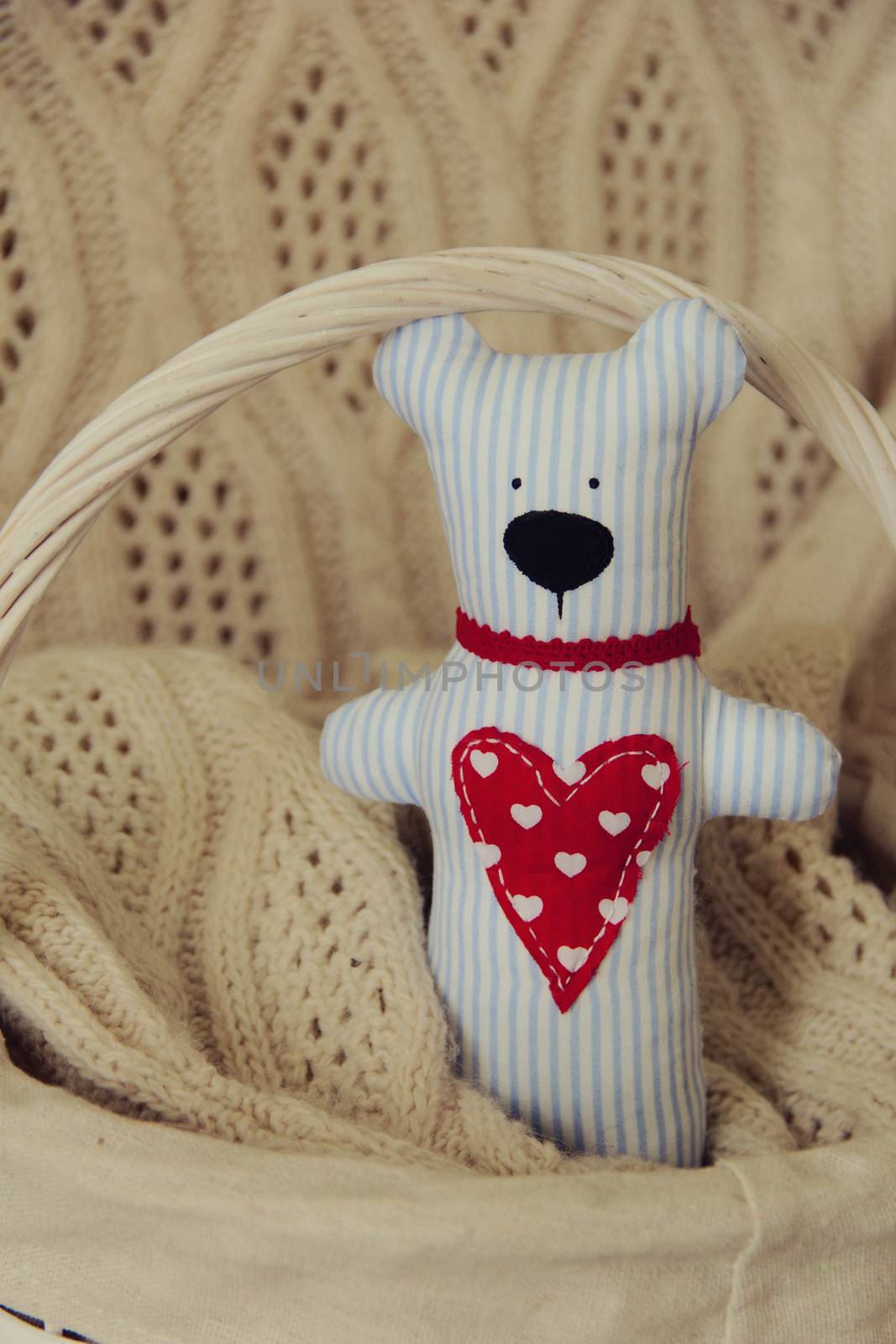 Handmade Teddy bear for Valentine day. Background. photo