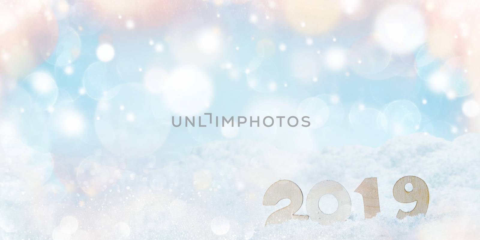 Sigh symbol of Happy new year 2019 holiday or Christmas , snow and bokeh lights background with copy space for text