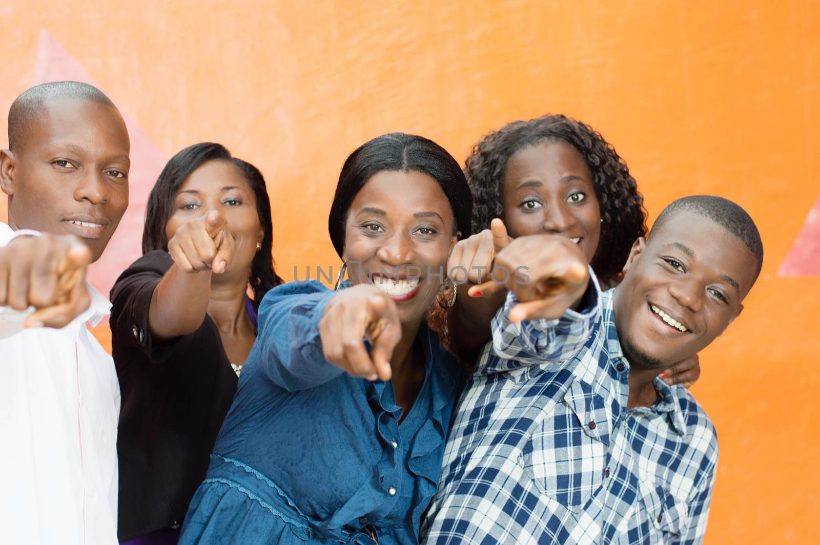 This group of young friends happy designate someone telling him that it was he they want.