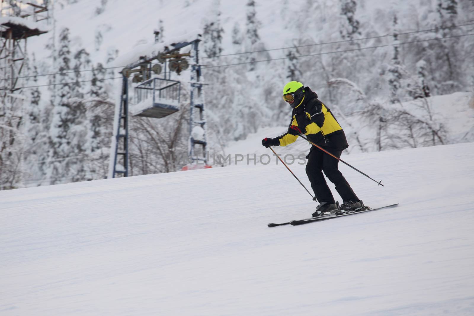 Alpine skier at arctic slope by destillat