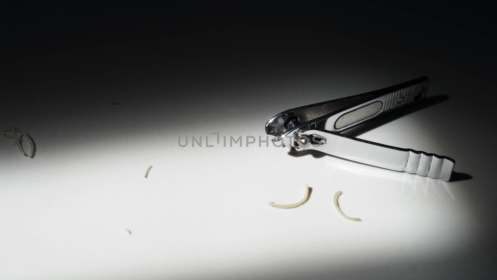 Close-up images of nail clipper from top view angle  by gnepphoto
