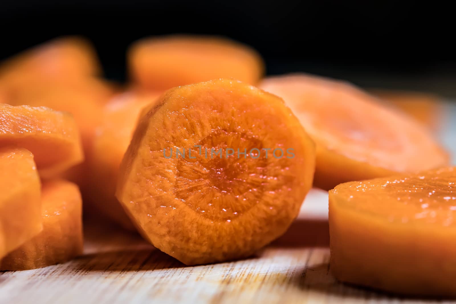 Closeup of orange carot slices by w20er