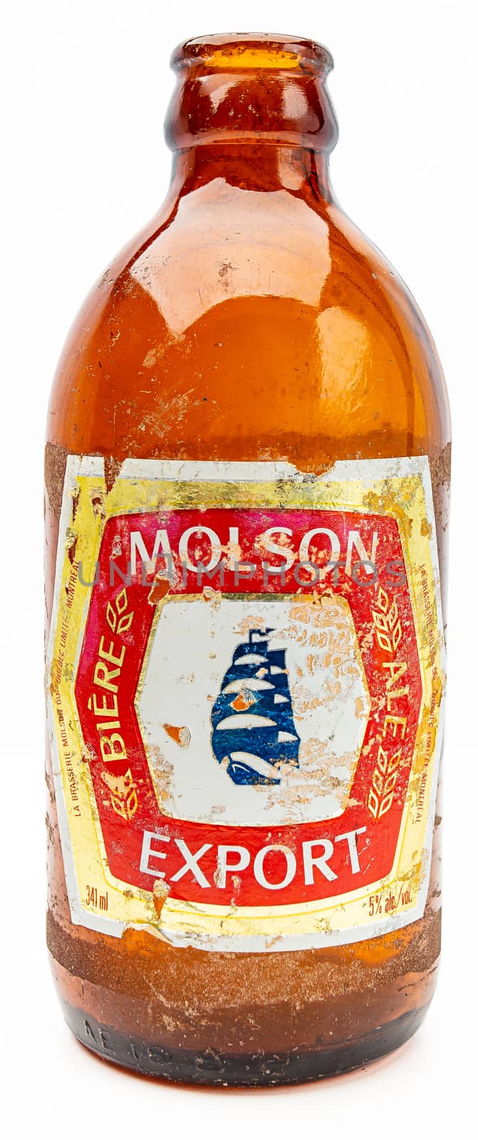Old Molson Export beer bottle isolated against white background