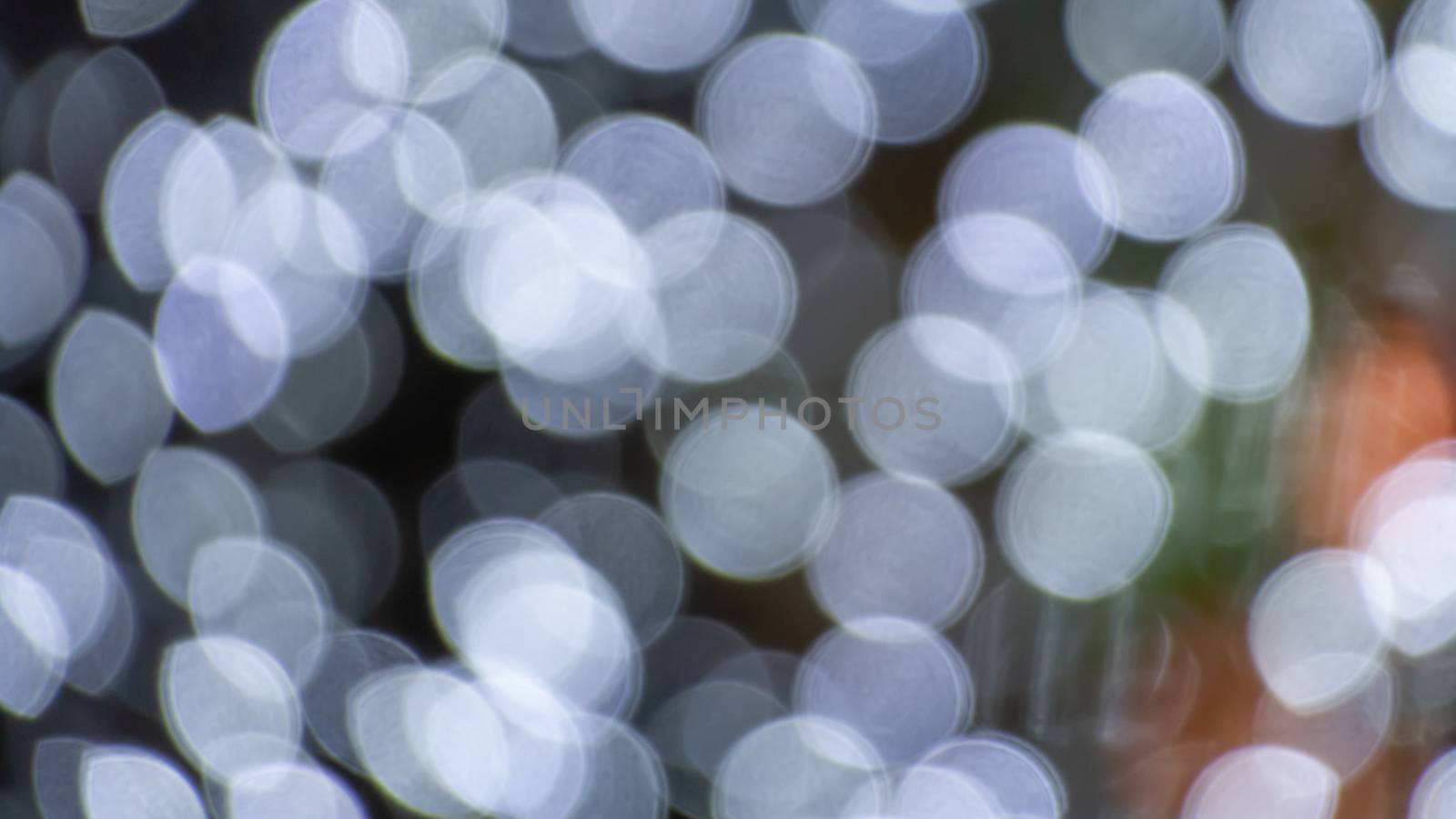 Abstract & Festive background with bokeh defocused lights