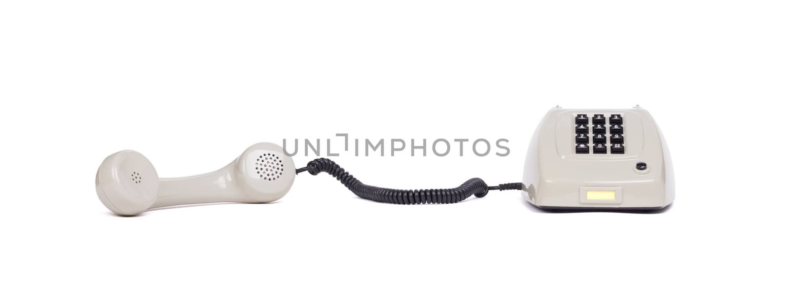 Vintage grey telephone with a white background