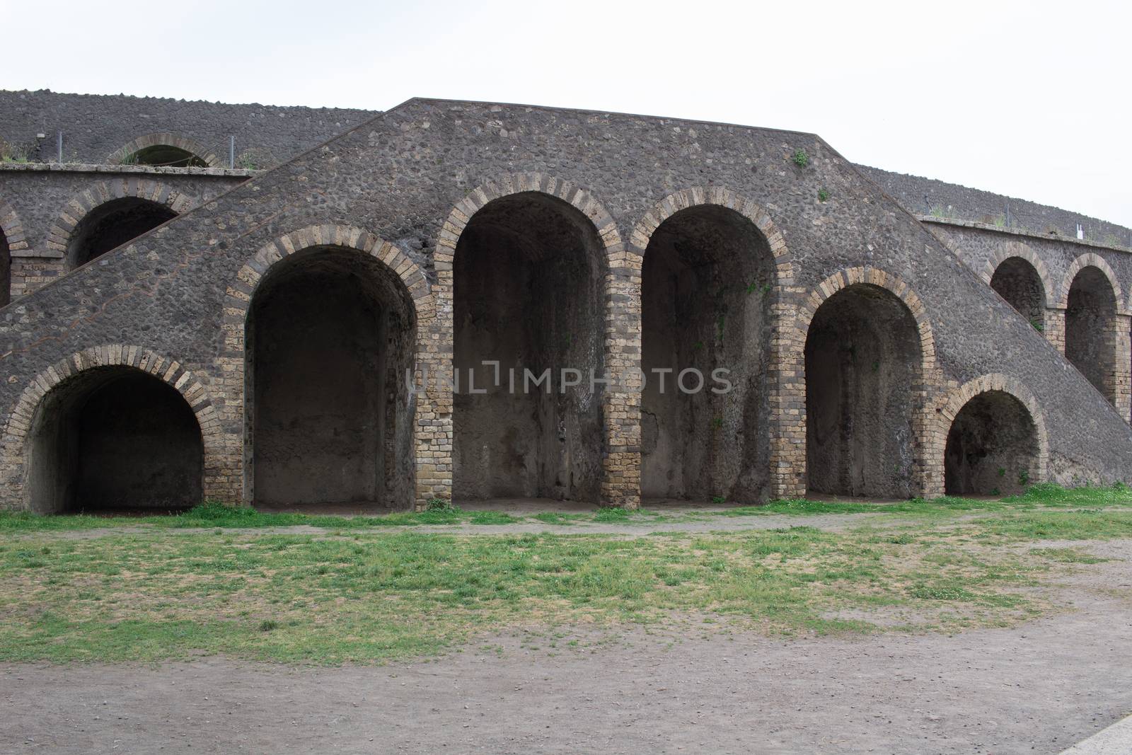 Old ancient ruined stones of Italian Roman Pompei houses streets