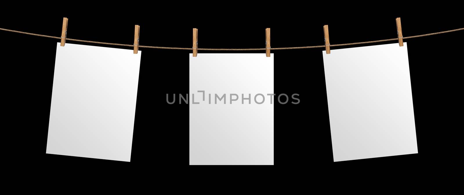 Empty paper sheet hanging on rope, isolated on black background, mock up for your project, poster template by xamtiw