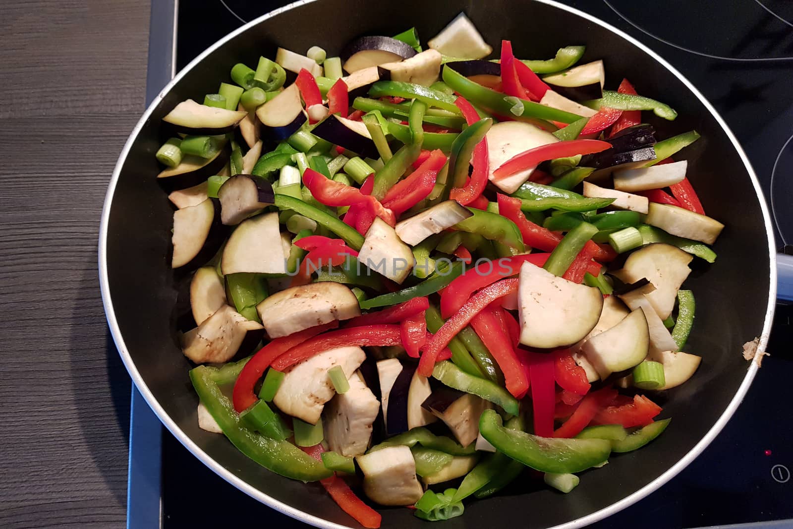 Grilled vegetables in a cast iron grill pan, top view