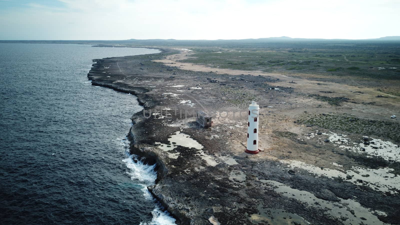 Lighthouse sea beach coast Bonaire island Caribbean sea aerial drone top view