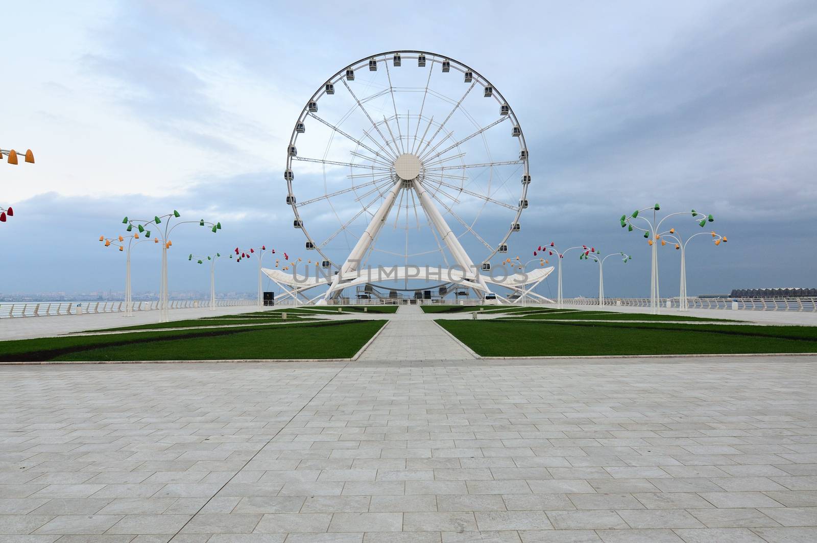 Baku Ferris wheel on the shore of the Caspian Sea by moviephoto