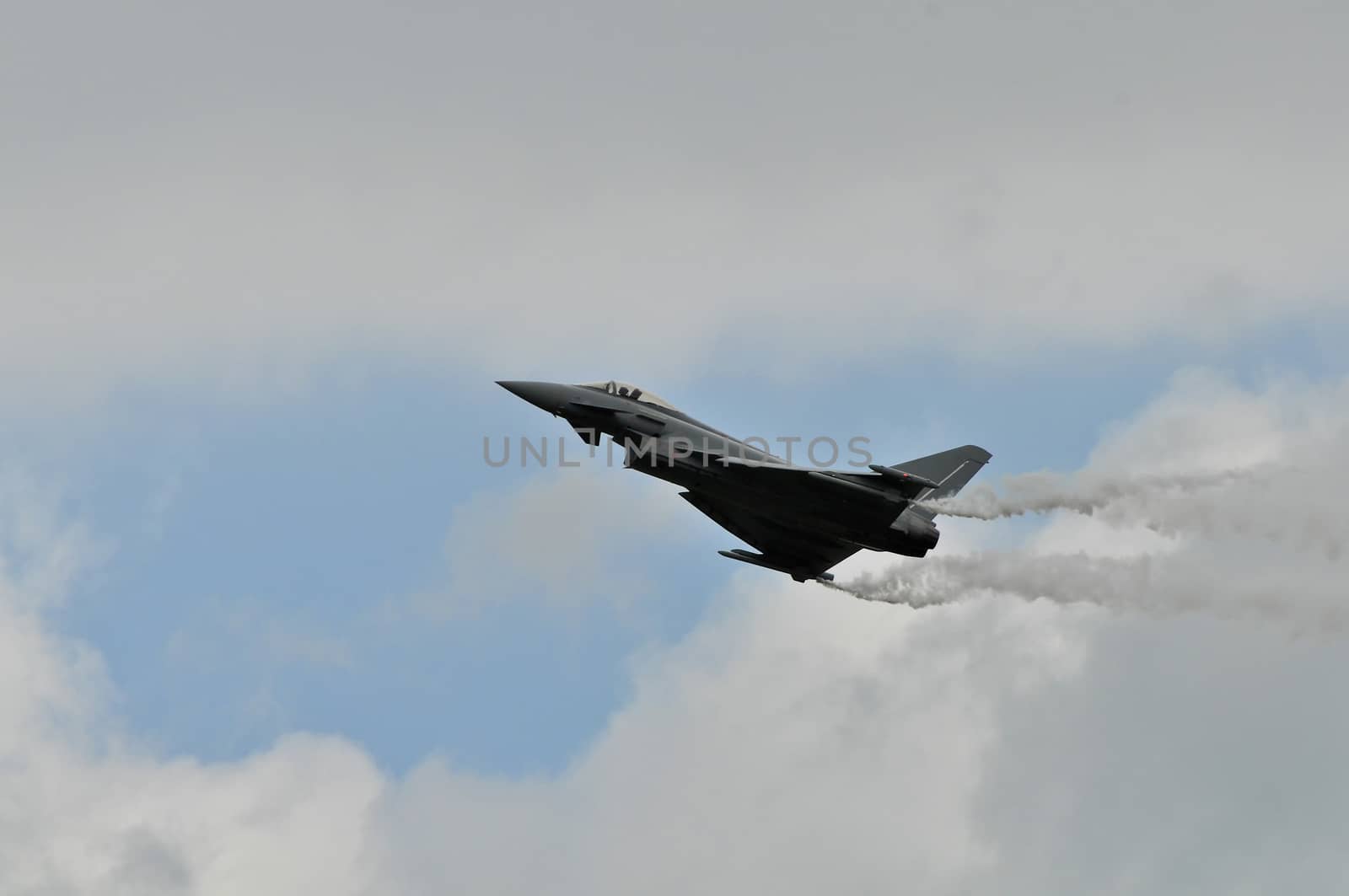 Eurofighter Typhoon on training flight above military airbase in Zeltweg Austria. The Typhoon is Europe's attempt constructing a modern jet fighter.