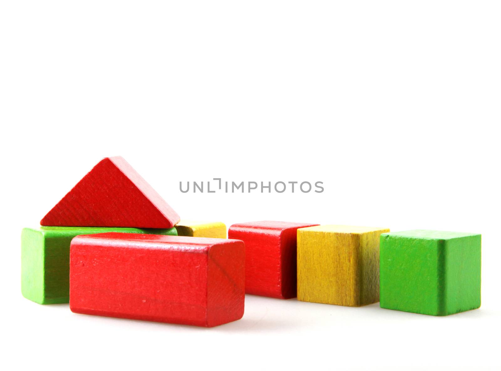 Colorful Wooden Blocks Isolated On White Background by nenovbrothers