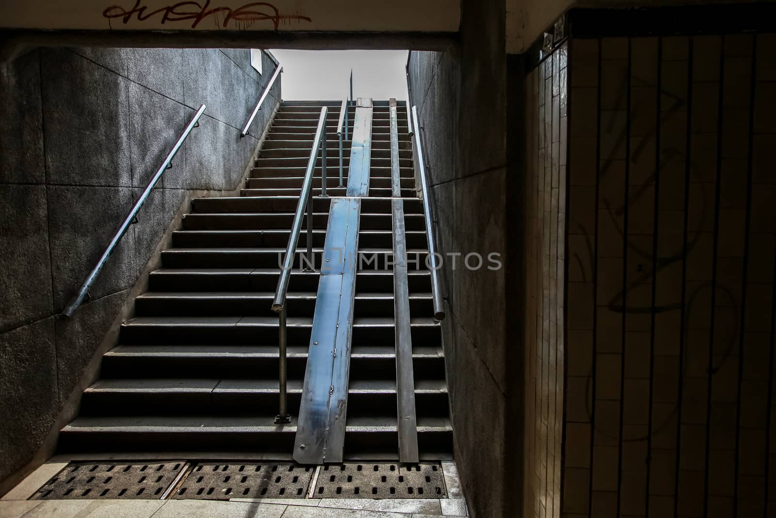 Pedestrian tunnel stairs in Riga, Latvia. Stairs leading out of concrete pedestrian tunnel to the city. 