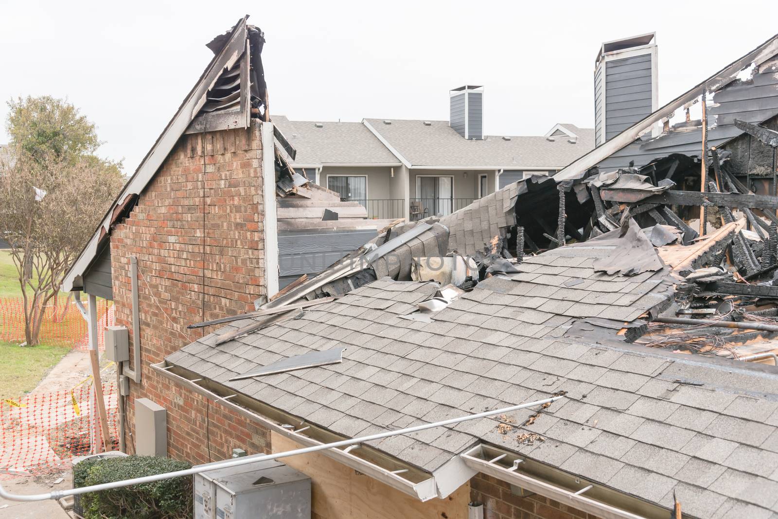 Damaged apartment building after burned by fire in Texas, USA by trongnguyen