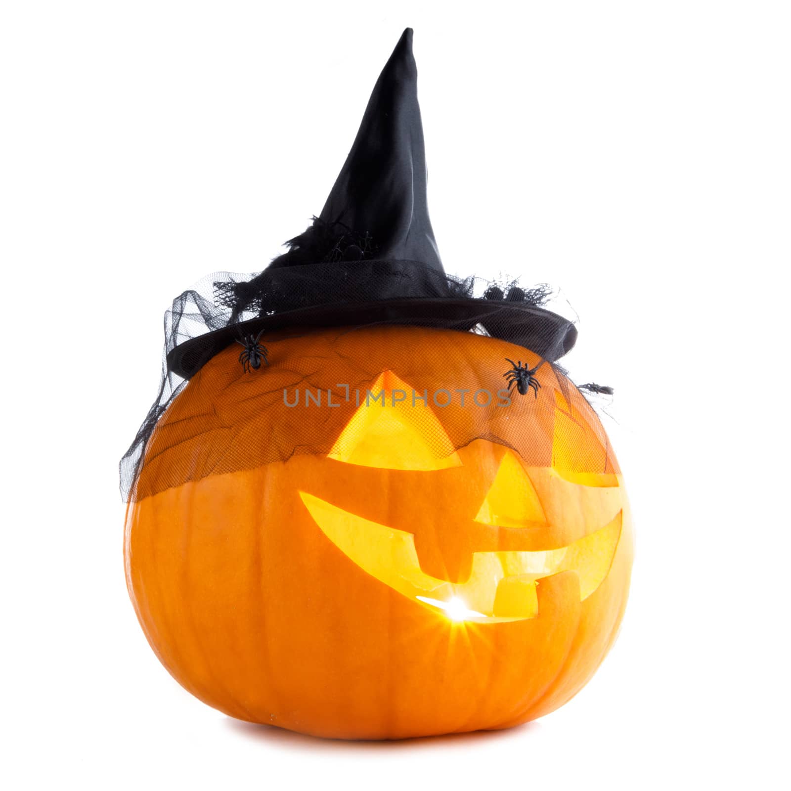 Jack O Lantern Halloween pumpkin with witches hat isolated on white background