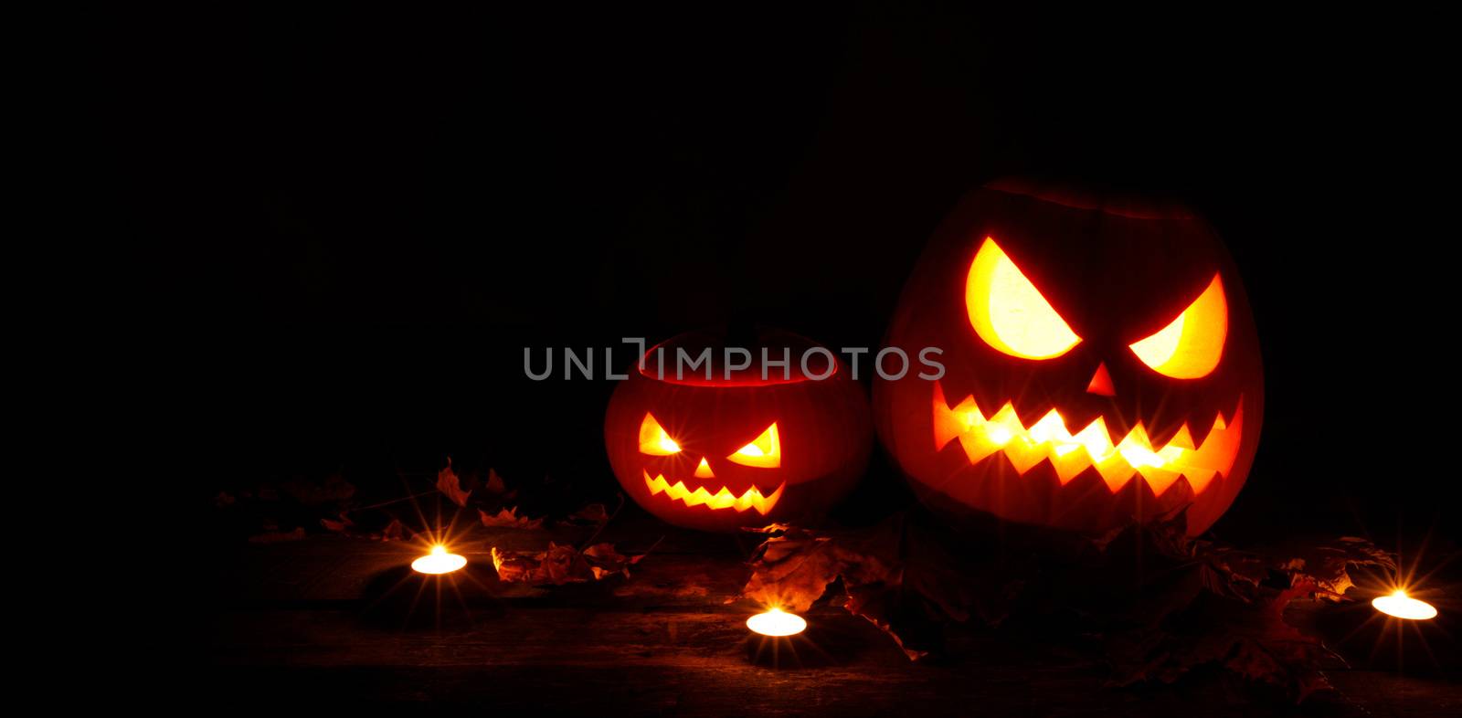 Halloween pumpkin and candles by Yellowj
