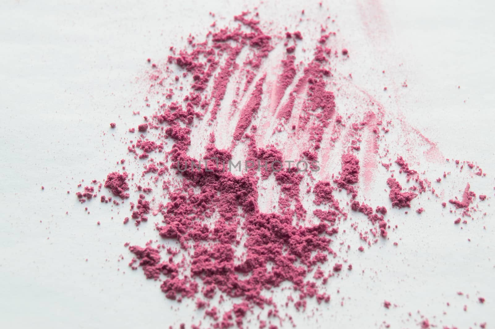 Multiple pink powder for the face, eyeshadow on white background, Decorative cosmetics for makeup.