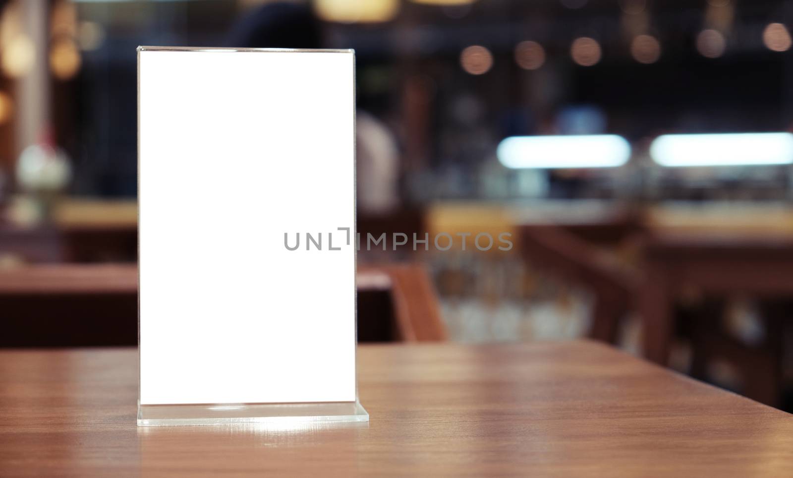 Menu frame standing on wood table in Bar restaurant cafe. space  by peandben