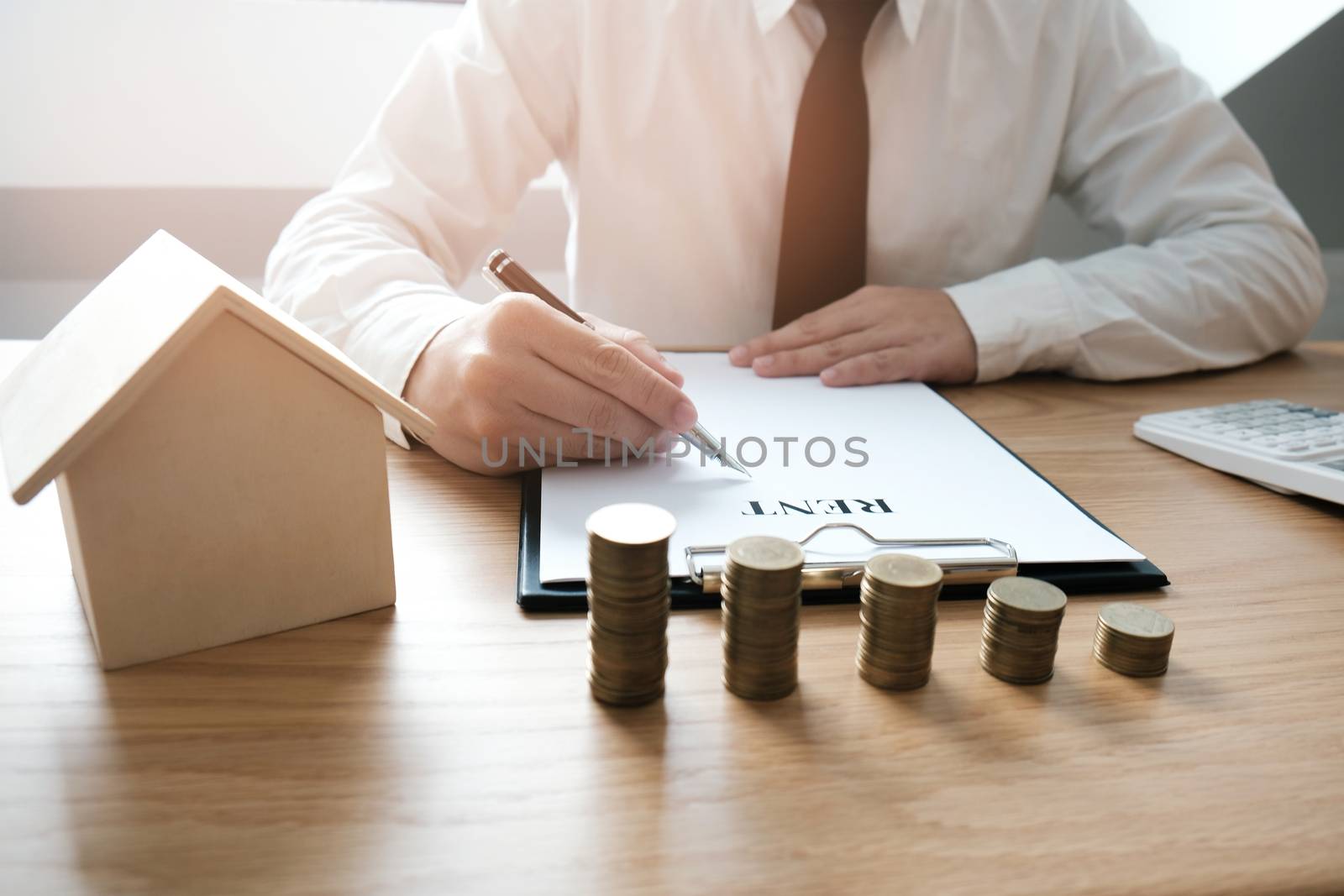 Business people signing contract making a deal with real estate agent Concept for consultant and home insurance concept