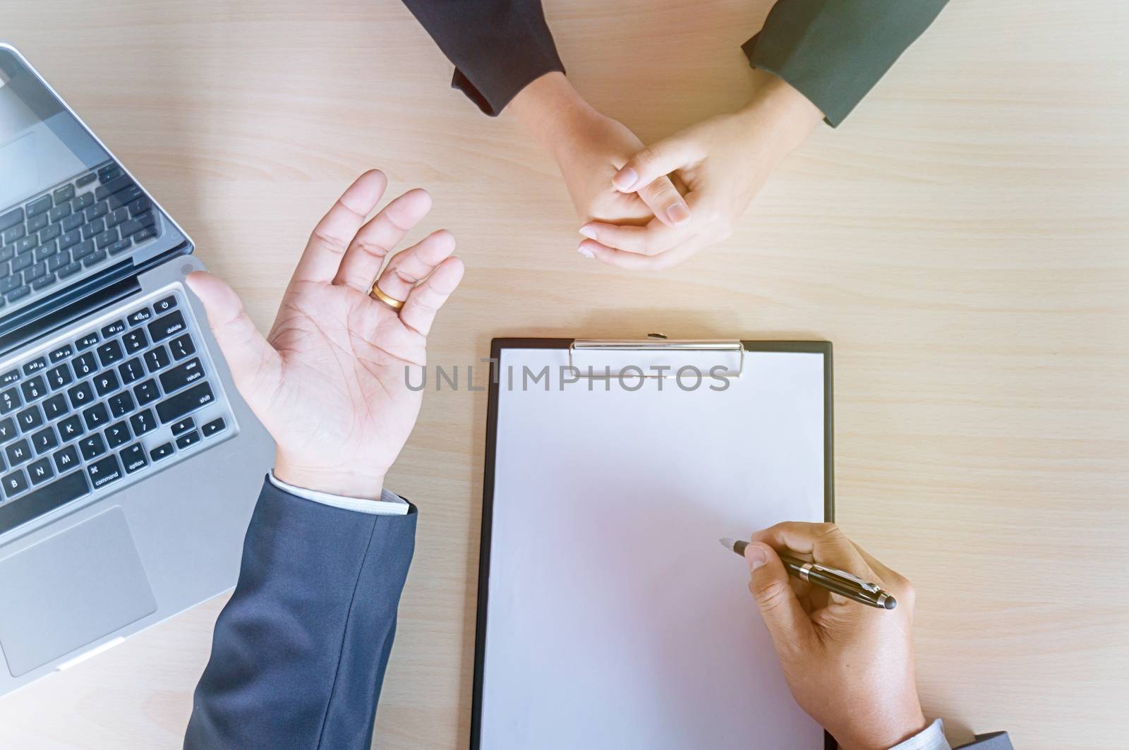 Young attractive man during job interview. human resources conce by peandben