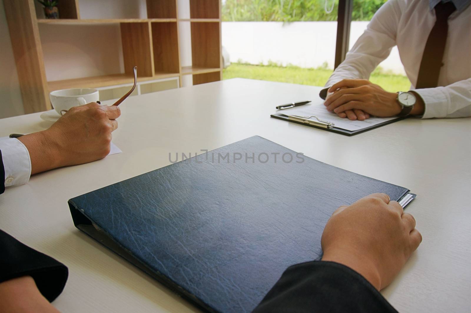 Young attractive man during job interview. human resources conce by peandben