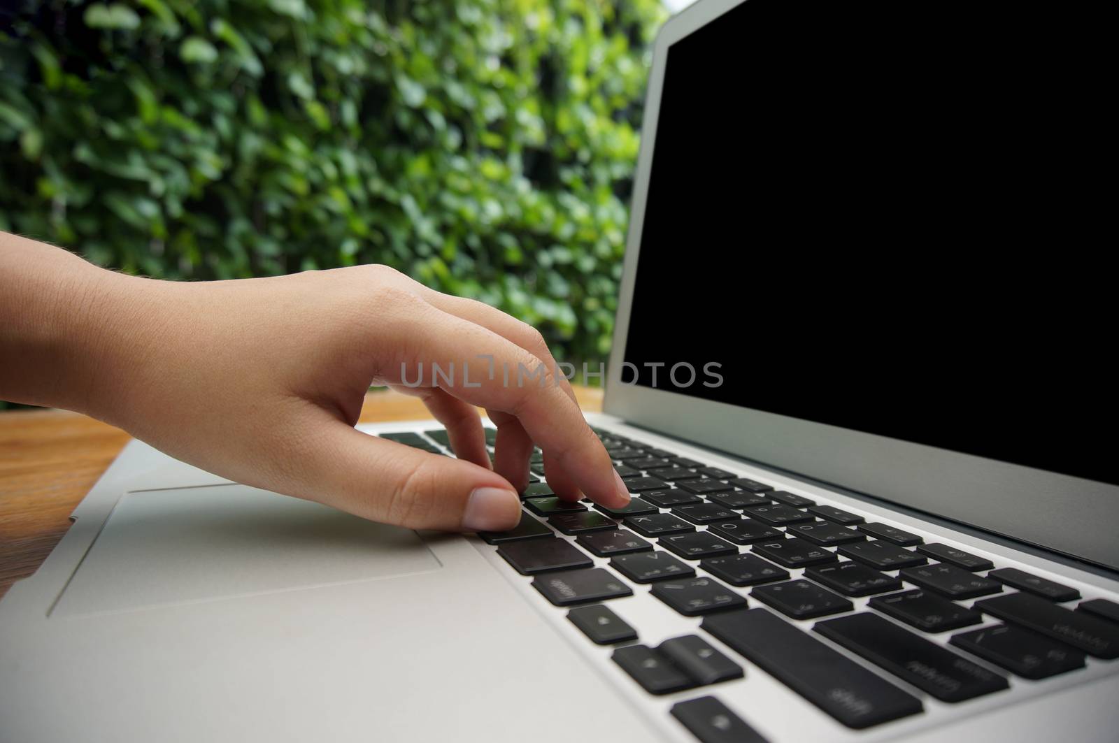 The Casual business woman works Hand typing on laptop keyboard. by peandben