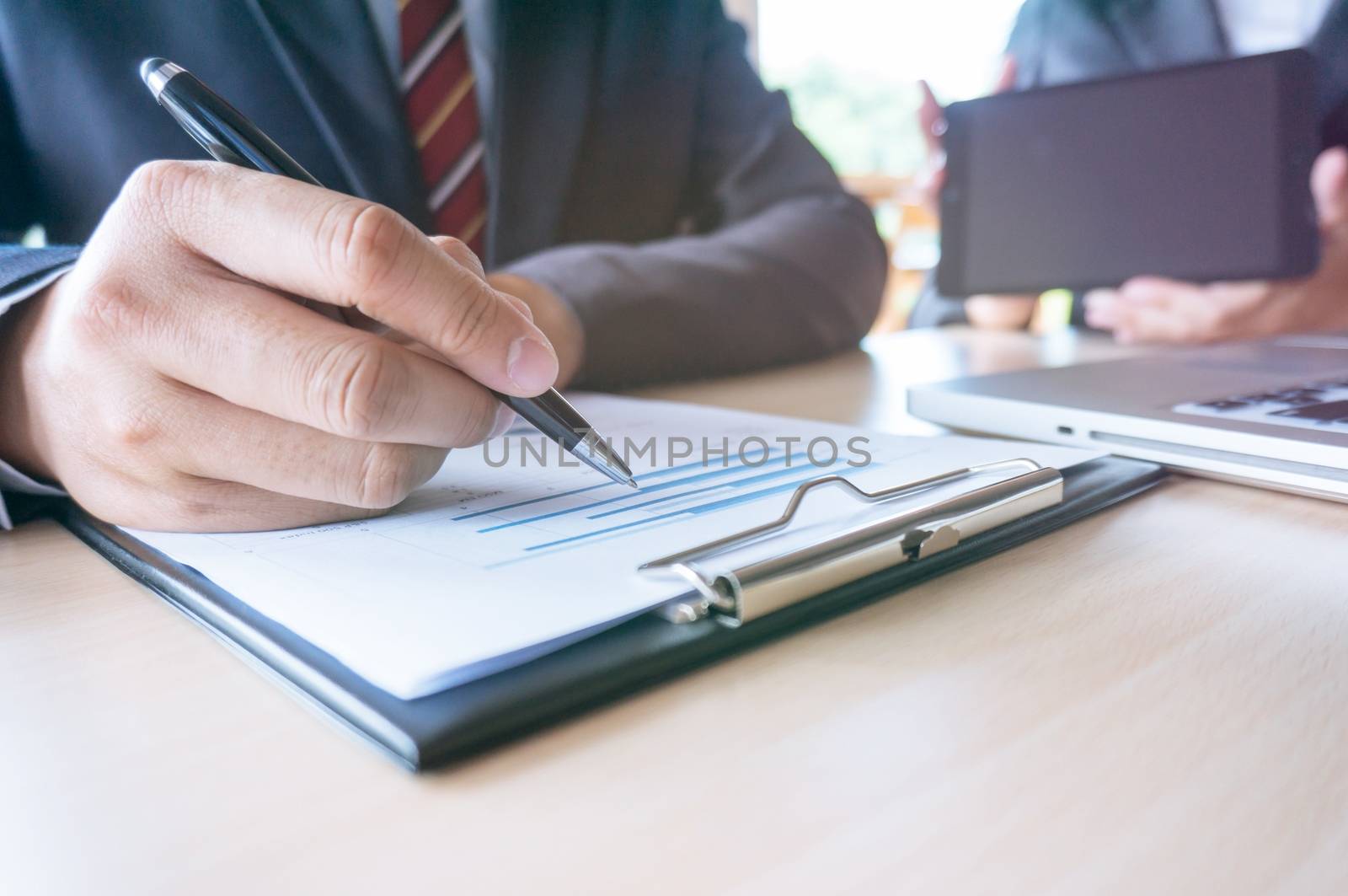 Man Completing Application Form during job interview. human resources concept