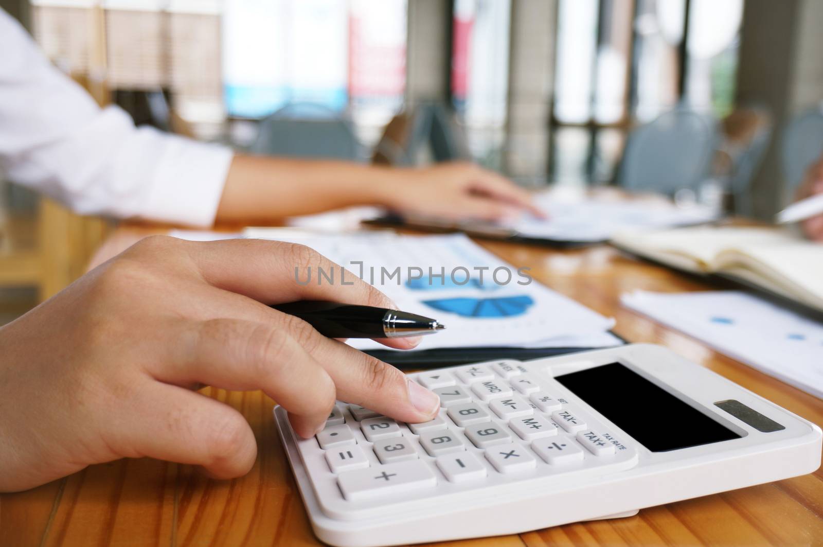 Financial inspector making report, calculating or checking balance. Business Audit concept.