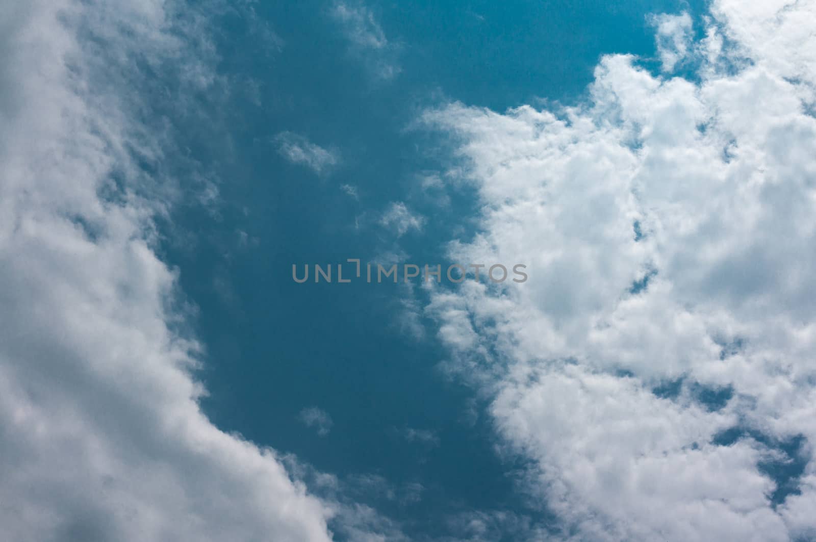 Beautiful Cumulus Cloud in the Bright Sky Background the sky and by peandben