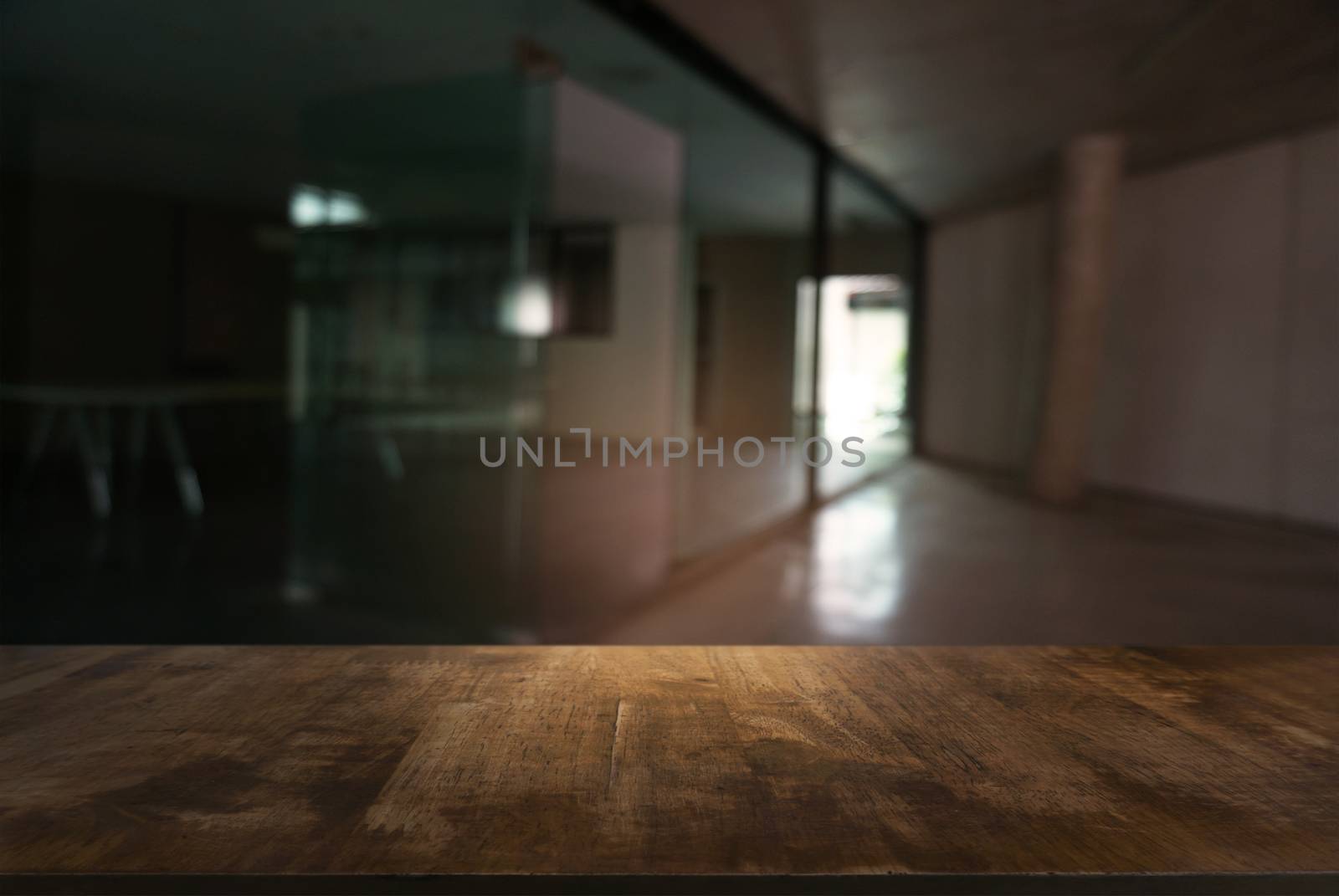 Empty wooden table in front of abstract blurred background of restaurant . can be used for display or montage your products.Mock up for display of counter