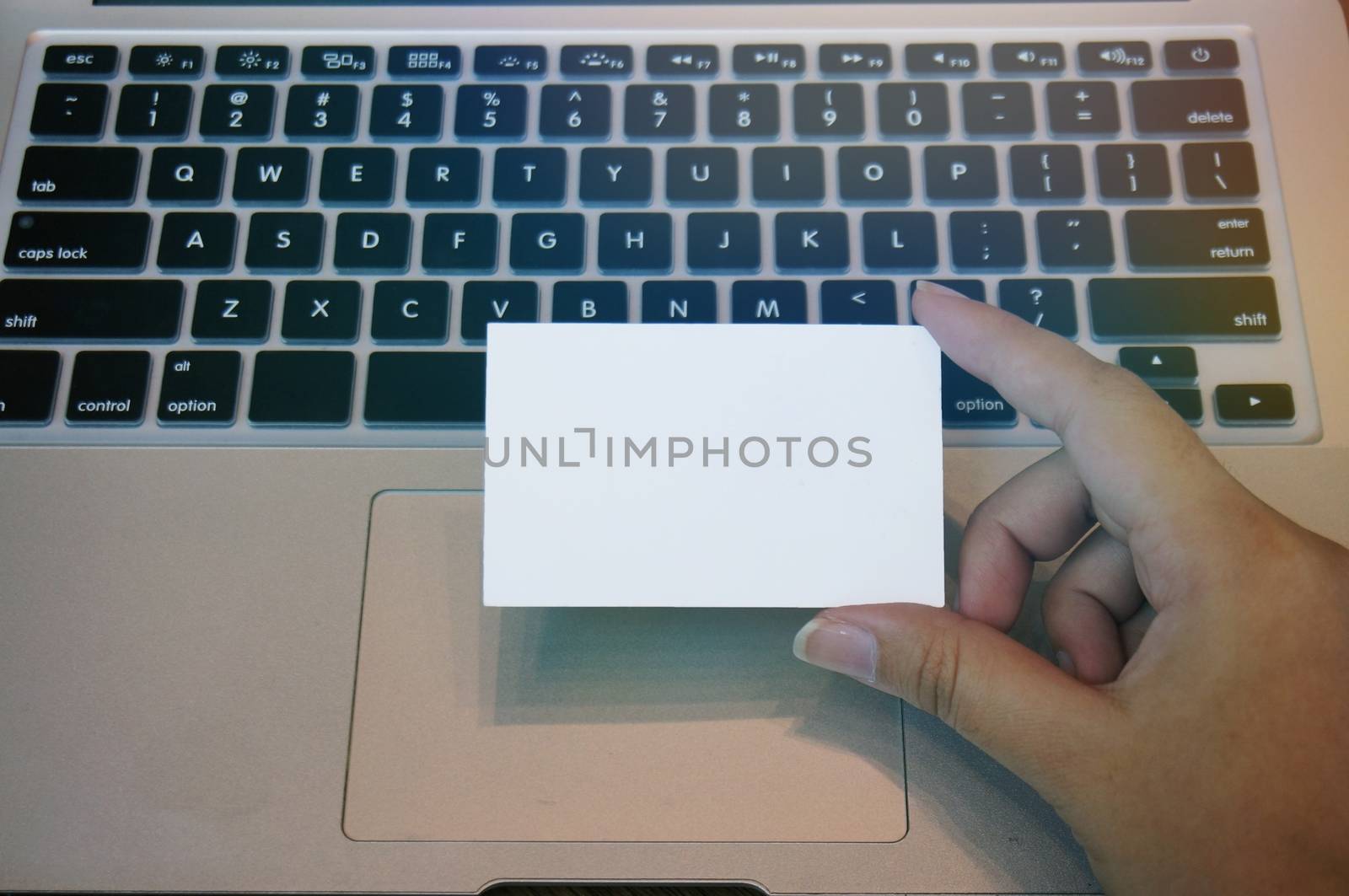 Close up of women hands holding business name card blank copy sp by peandben