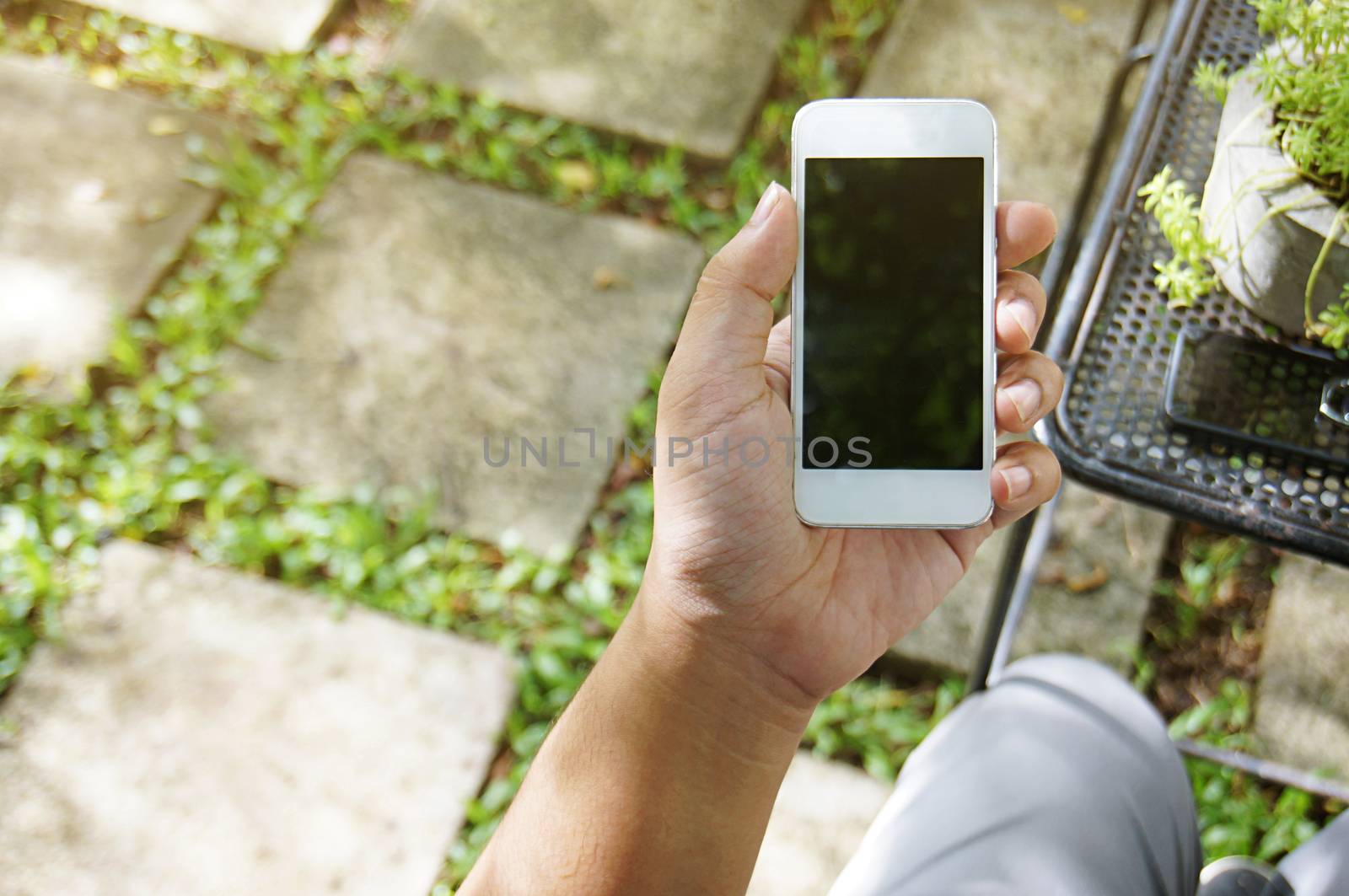 Close up of women's hands holding cell telephone blank copy space screen. smart phone with technology concept