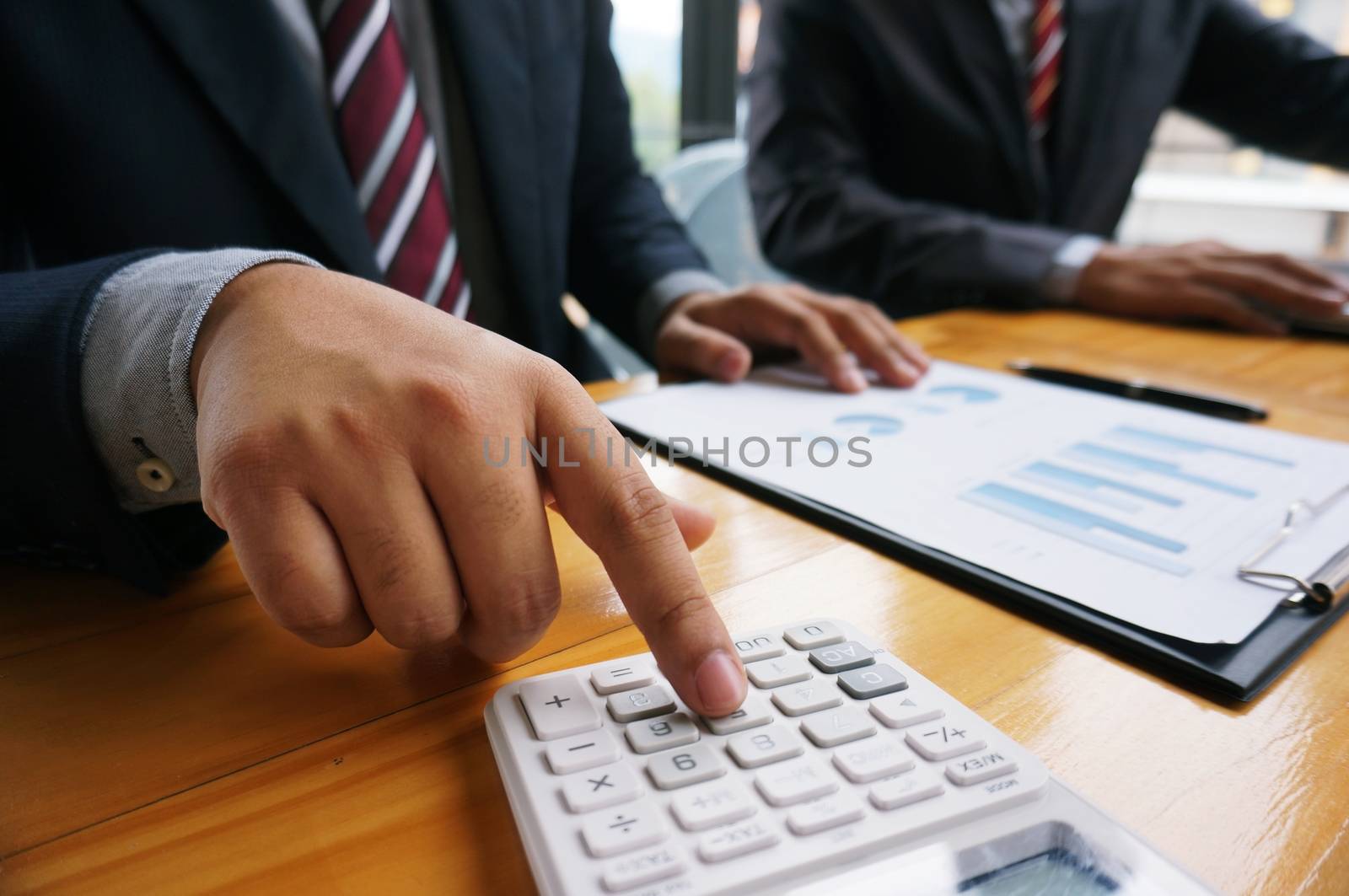 Financial inspector making report, calculating or checking balance. Business Audit concept.